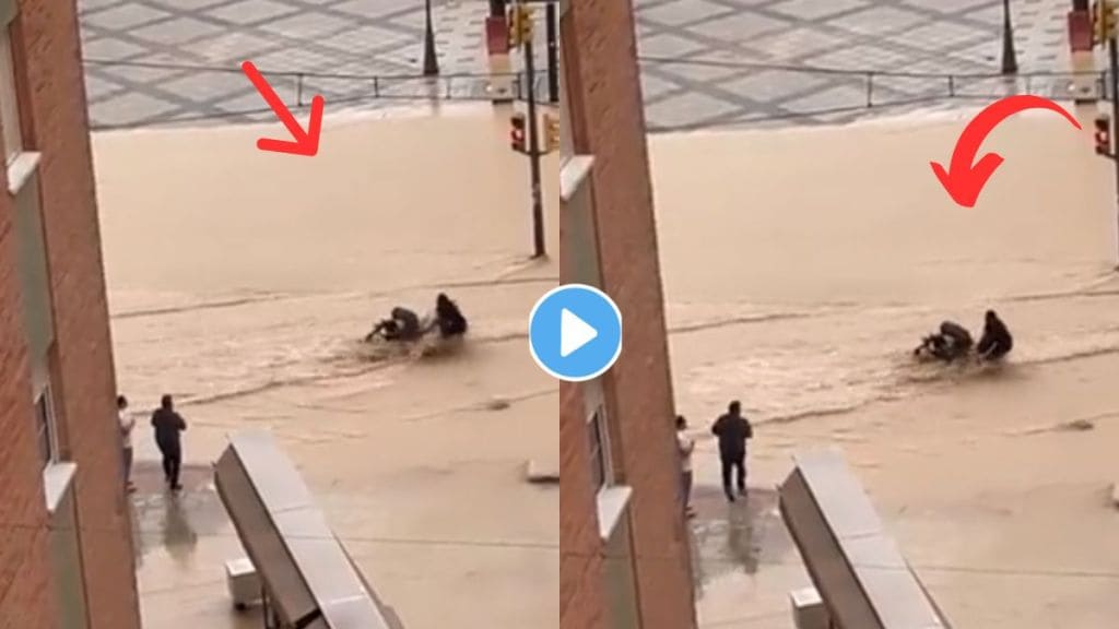 Man Saves Child In Flood Video Viral