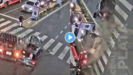 A woman had a narrow escape after two cars collided in a street in La Plata, Argentina video viral on social media