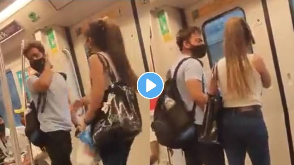 couple fight in metro video viral