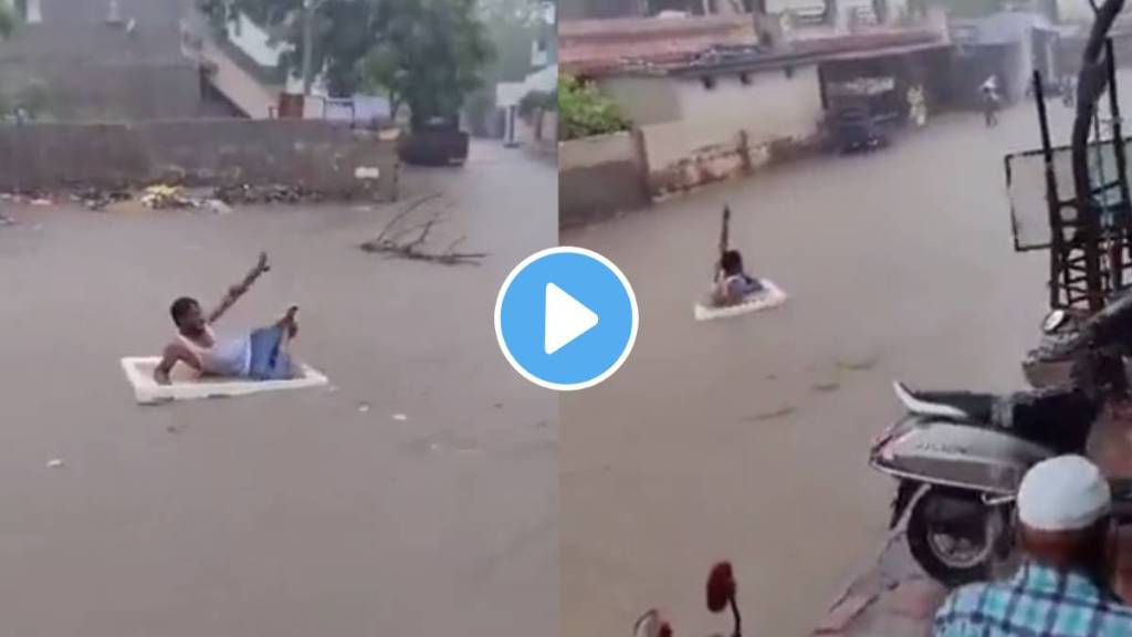 gujarat heavy rainfall man enjoying flood water video viral