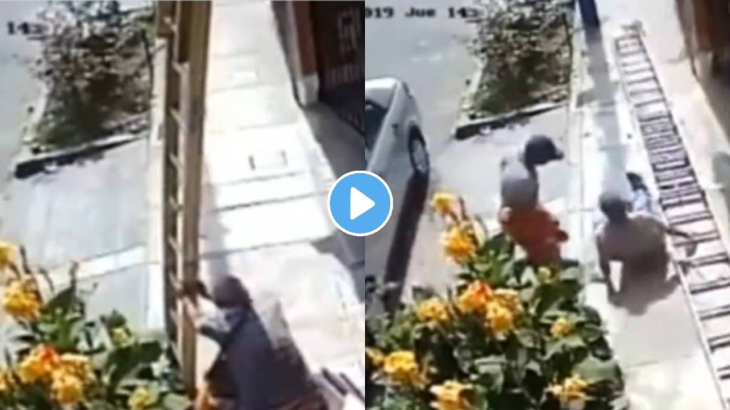 Man in wheelchair shakes painter's ladder because it is 'blocking the pavement' causing him to fall 30ft to the ground