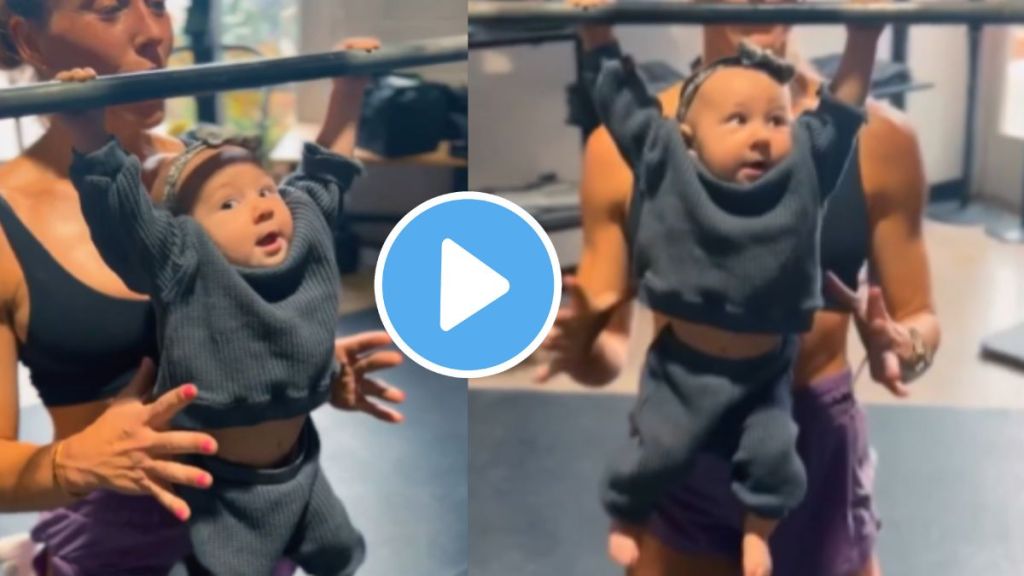 Viral Video one year child has done dead hanging exercise upto a mother counted 24 second video goes viral