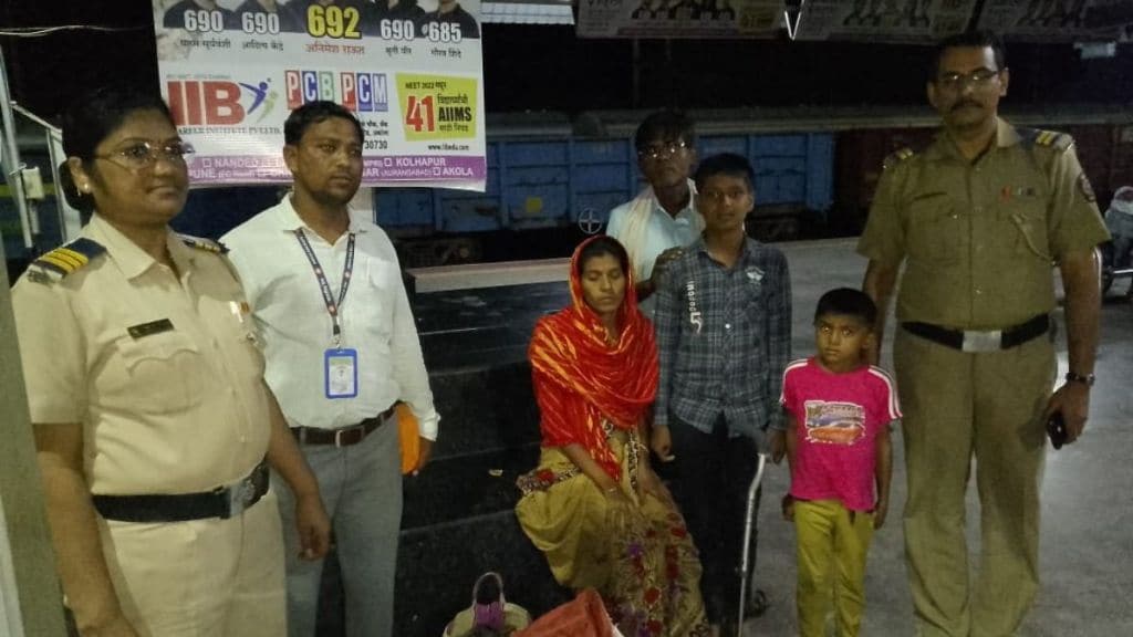 railway police with Handicapped person and family