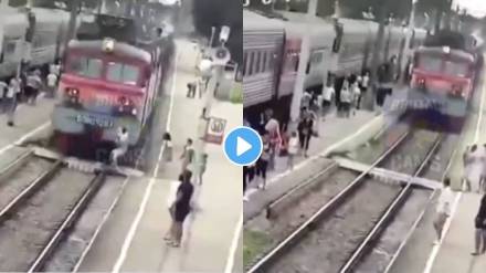 father son crossing railway track train accident viral video trending today shocking video viral on social media