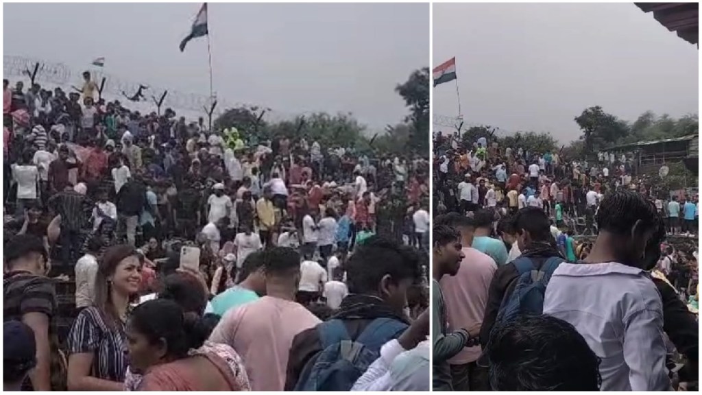 tourists at Bhushi Dam in Lonavala