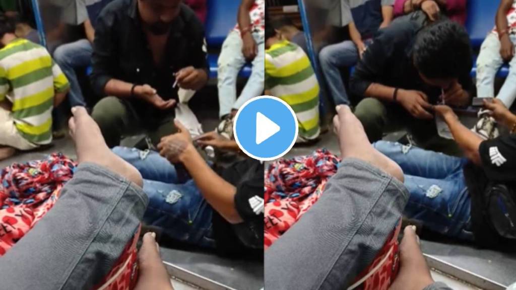 Video Shows Man Consuming Drugs On Mumbai Local, Railway Police Responds video viral on social media trending today