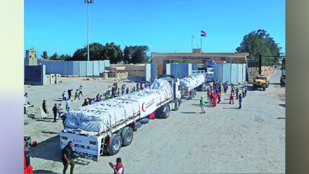 Aid flows into Gaza from the border with Egypt closed by Israel