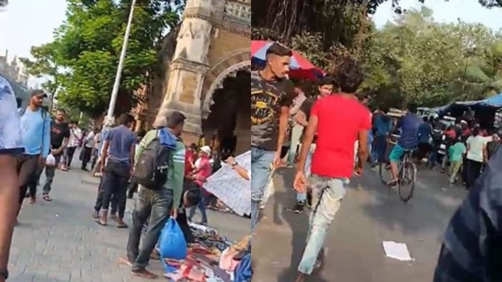 Crowd of hawkers on the sidewalk