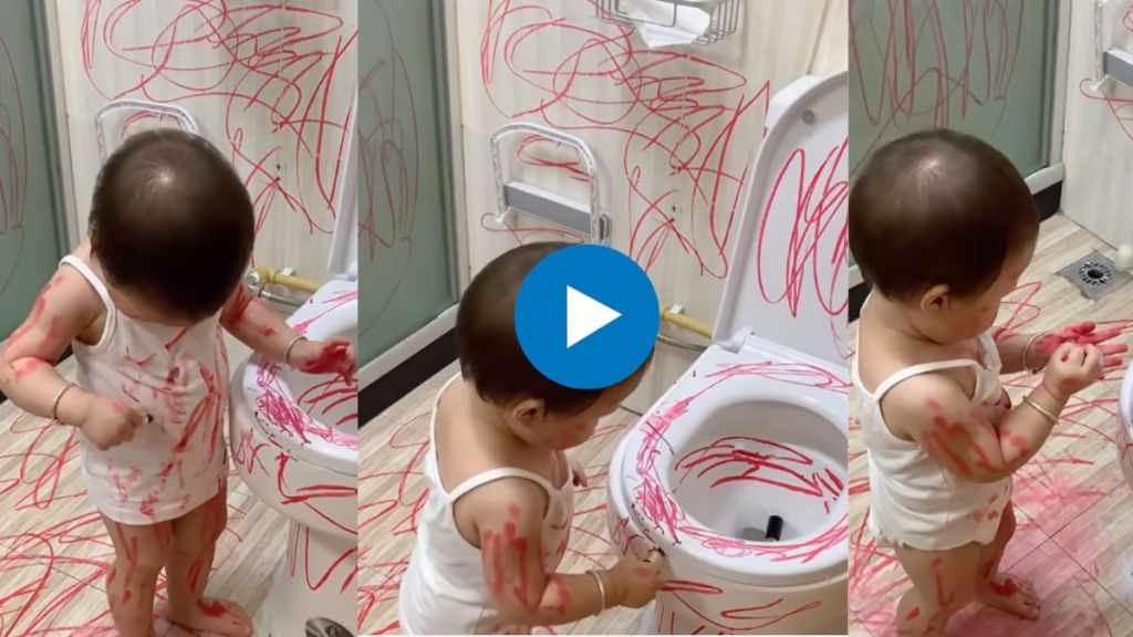 kid scribbles on toilet with dark red lipstick