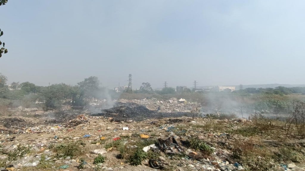 Garbage burning next to Ambernath station