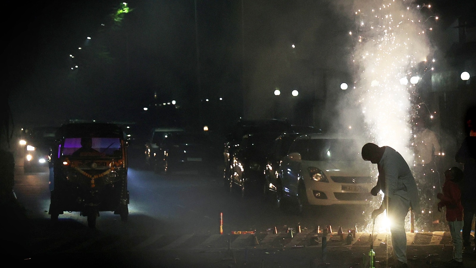 People burst fire works on the occasion of Diwali amid high AQI level since last month in Mumbai and MMR. (Express Photo by Amit Chakravarty)