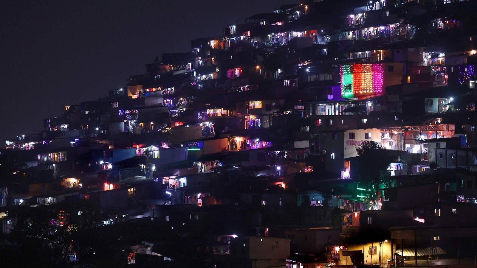 A slum colony in the central suburbs is decorated with lanterns and lights as they celebrate Diwali in Mumbai. (Express Photo by Amit Chakravarty)