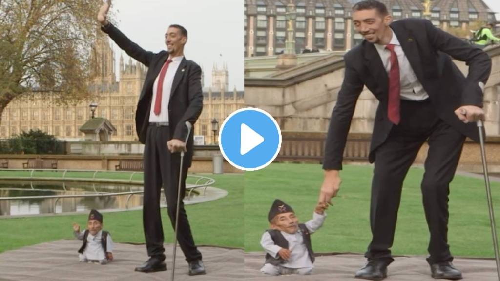 showing worlds tallest man standing with sorlds shortest man in london gwr old video goes viral