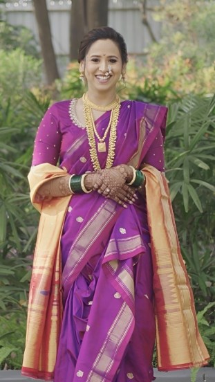 Swanandi Tikekar Wedding Purple Nauvari Saree