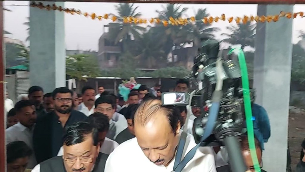 ajit pawar camera hit, ajit pawar hit by camera in pune