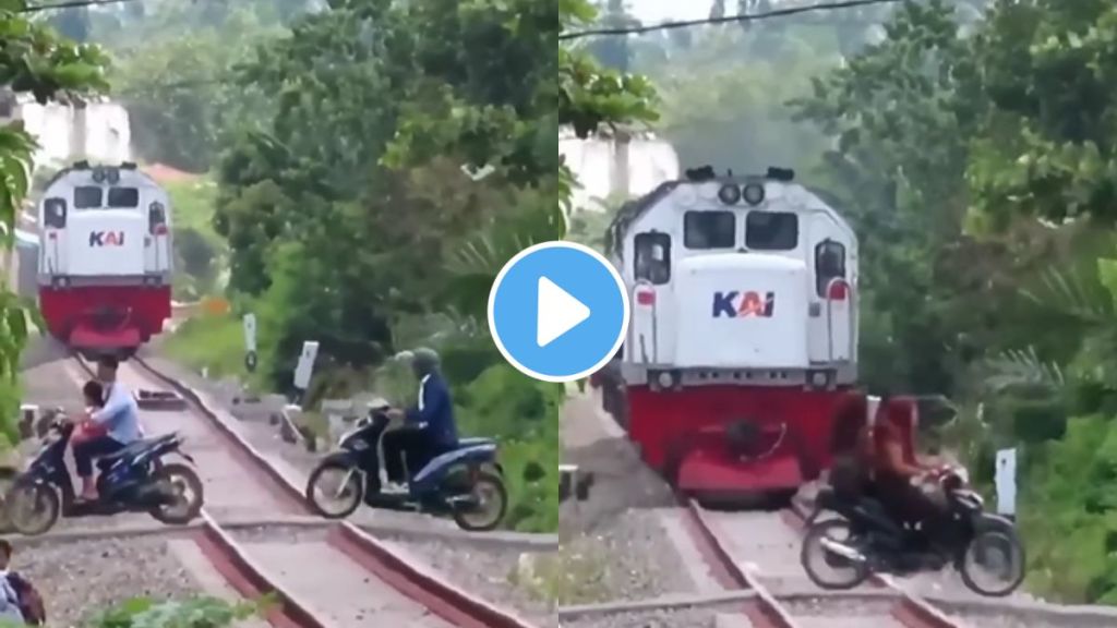 people crossing railway track