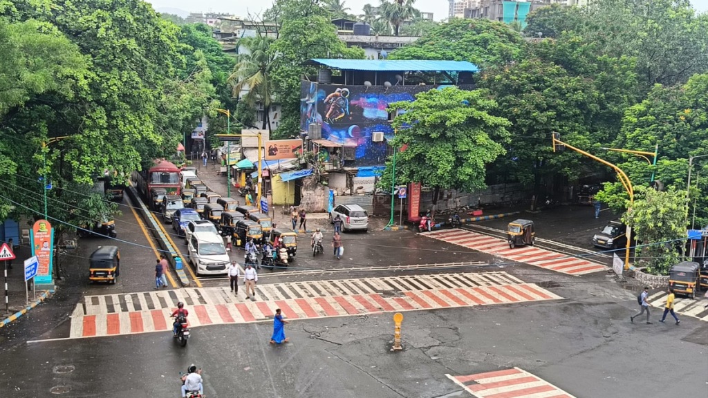 white-red color zebra crossing these color stripes are drawn experimental basis tin haat naka chowk thane