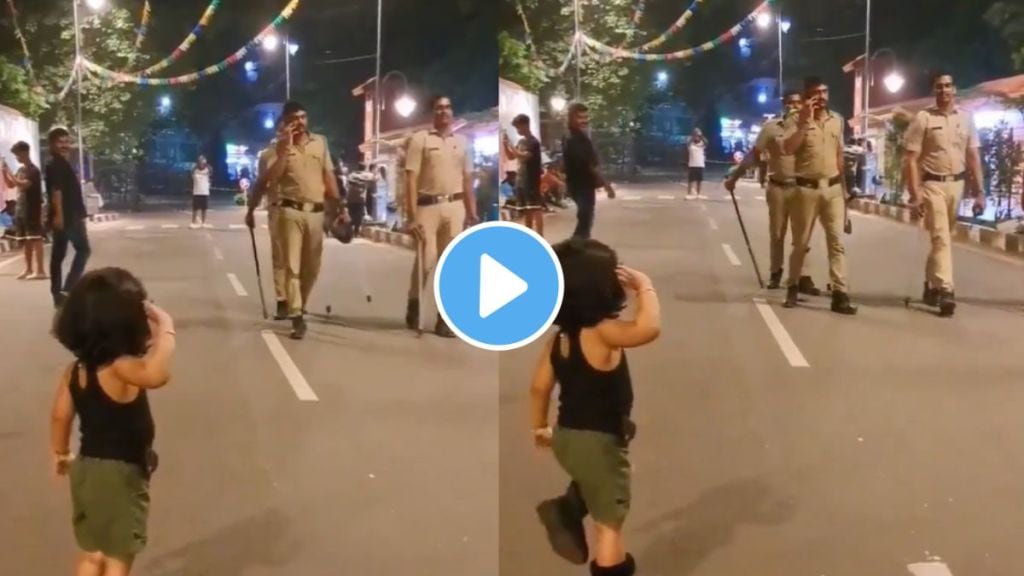 a child girl greet police with a salute