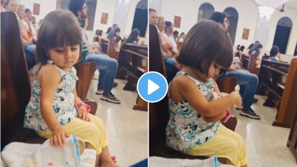 a child girl treating chappal as a baby