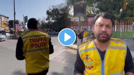dehradun police imposed duty on a person for breaking traffic rules video is going viral