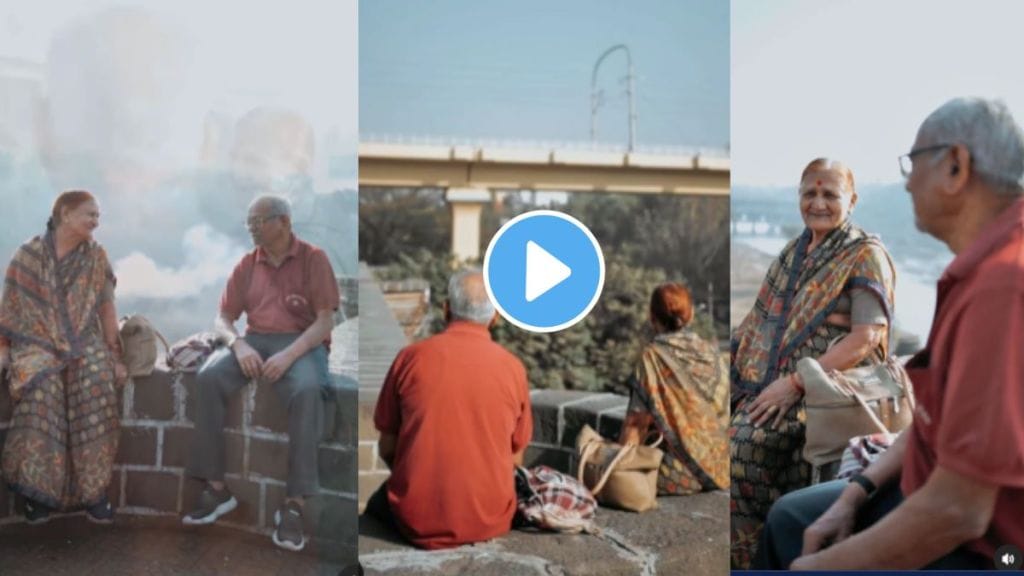 old couple sitting on manpa pool in pune