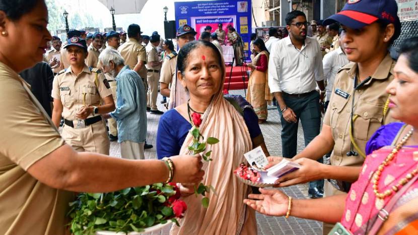 On behalf of International Women Day Police Officers giving roses Every Women On CSMT Railway Police Station 