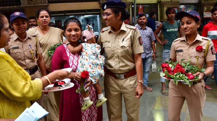 On behalf of International Women Day Police Officers giving roses Every Women On CSMT Railway Police Station 