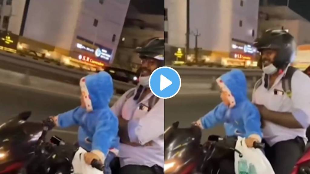 viral video 3 year old boy riding bike on highway with father