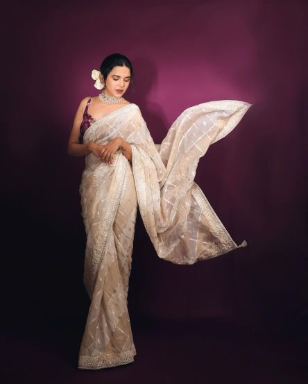 Mitali Mayekar golden designer saree and purple sleevless blouse look photos viral dvr 99