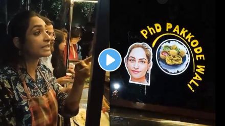 a young girl having phd degree is selling pakoda