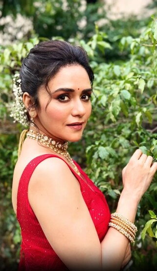 Amruta Khanvilkar Red Saree