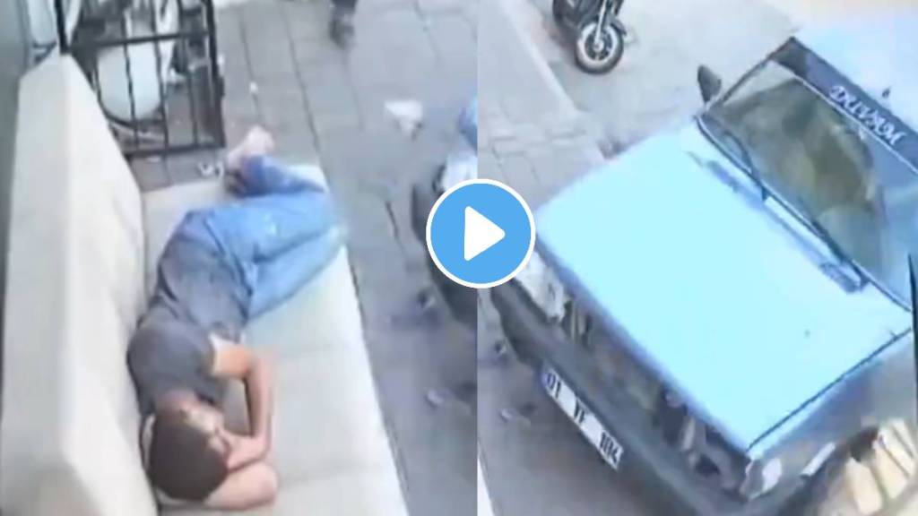 Viral Video Man sleeping comfortably on a sofa speeding car goes out of control and suddenly hits the young mans sofa