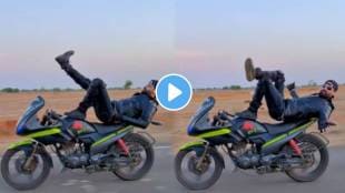 Man risky dance performs on a running bike for the Pushpa Pushpa hook step
