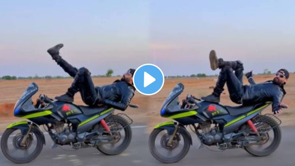 Man risky dance performs on a running bike for the Pushpa Pushpa hook step