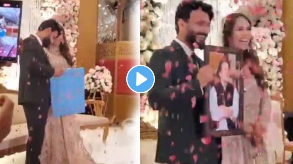 Pakistani groom gives his bride a photo of former Prime Minister