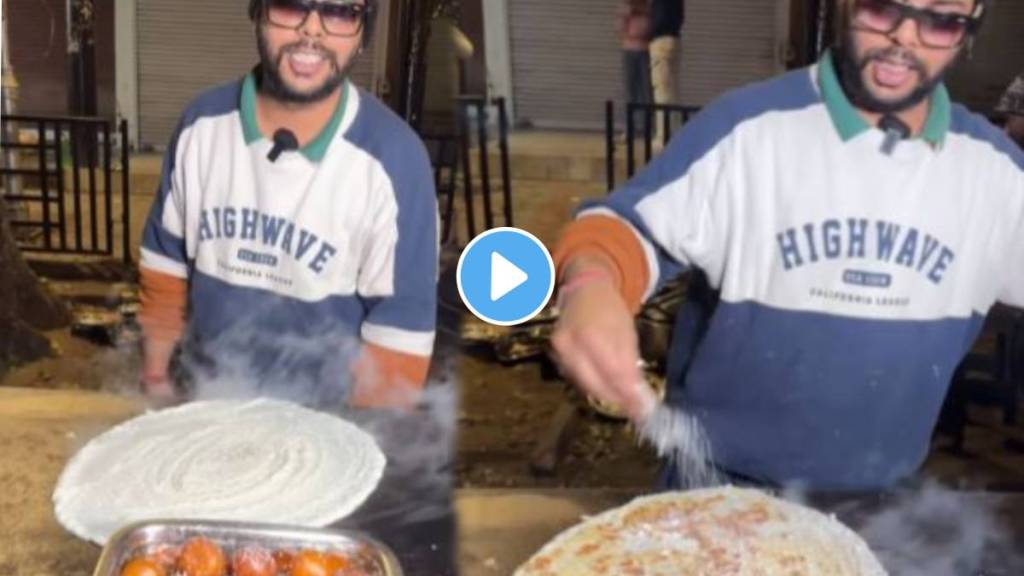 young man making Gulabjam Dosa