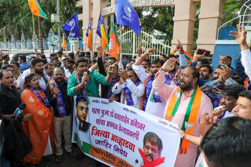 Supporters of Republican Party of India (RPI) protest against NCP-Sharad Pawar leader Jitendra Awhad’s act of tearing a poster of Dr. Babasaheb Ambedkar, at Chaityabhoomi