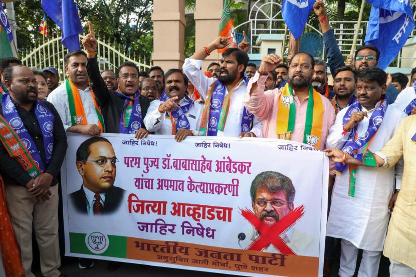 Supporters of Republican Party of India (RPI) protest against NCP-Sharad Pawar leader Jitendra Awhad’s act of tearing a poster of Dr. Babasaheb Ambedkar, at Chaityabhoomi