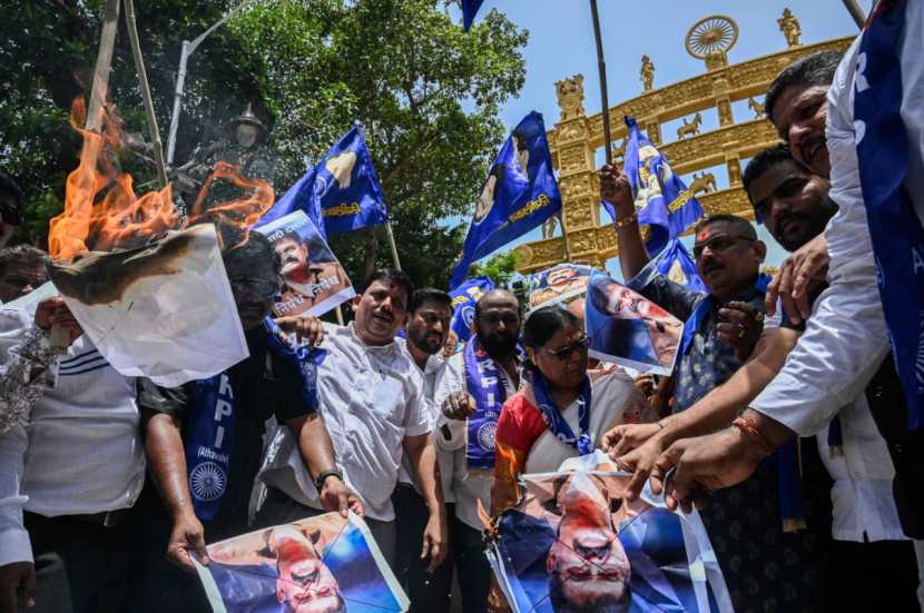 Supporters of Republican Party of India (RPI) protest against NCP-Sharad Pawar leader Jitendra Awhad’s act of tearing a poster of Dr. Babasaheb Ambedkar, at Chaityabhoomi