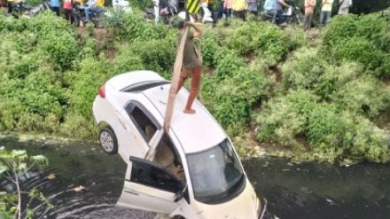 car Sinks in canal