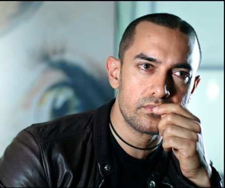 Aamir Khan sported a buzzcut in his movie Ghajini. While promoting the movie, he was seen in a similar hairstyle which garnered a lot of attention from fans. (Photo: X/@Aamir__Online)