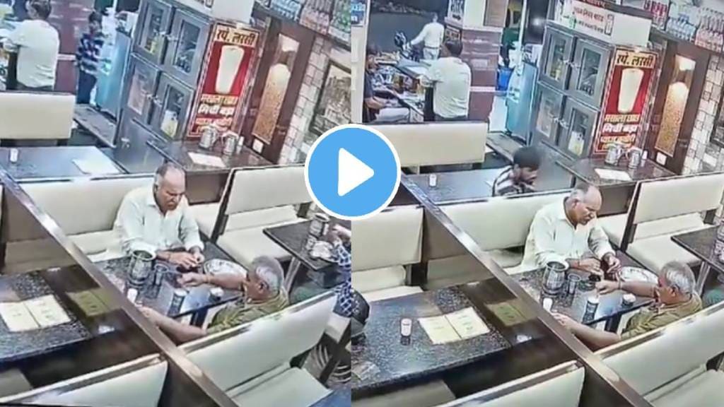 Viral The shocking video shows a man stealing a mobile phone in a restaurant Caught On hotel Camera watch