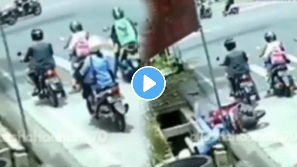 girl came with a scooty and fell straight into the drain