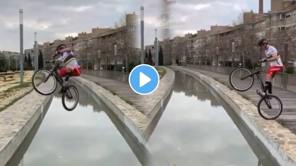 man tried to jump over the water stretch with his cycle A cyclist who understands physics well To execute the daring stunt