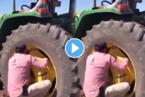 Yet another video of a dangerous stunt performed man performing a potentially deadly stunt to click a reel with the help of a tractor