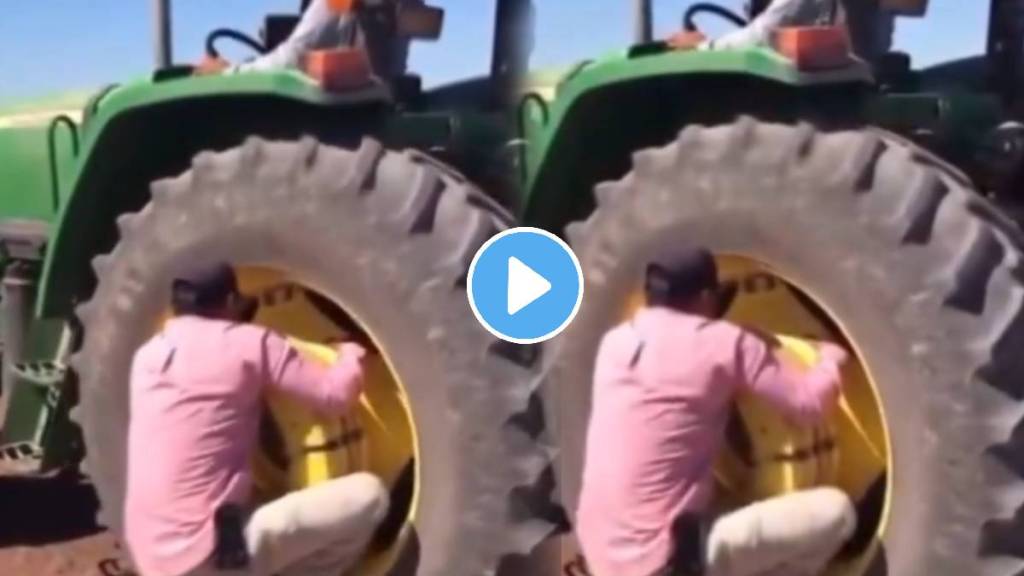 Yet another video of a dangerous stunt performed man performing a potentially deadly stunt to click a reel with the help of a tractor