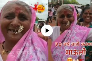 an old lady coming in Pandharpur Wari from last 30 years