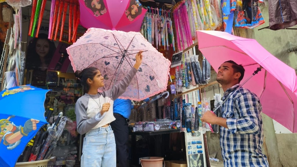 Crowds in the market to buy raincoats umbrellas thane