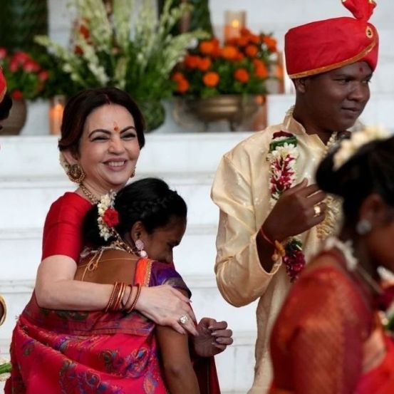 Mukesh Ambani and Nita Ambani organised mass wedding of the underprivileged being A newly married couple reaction