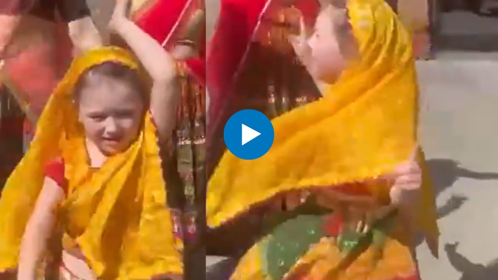 Russian girl in traditional Indian attire performs bhangra dance